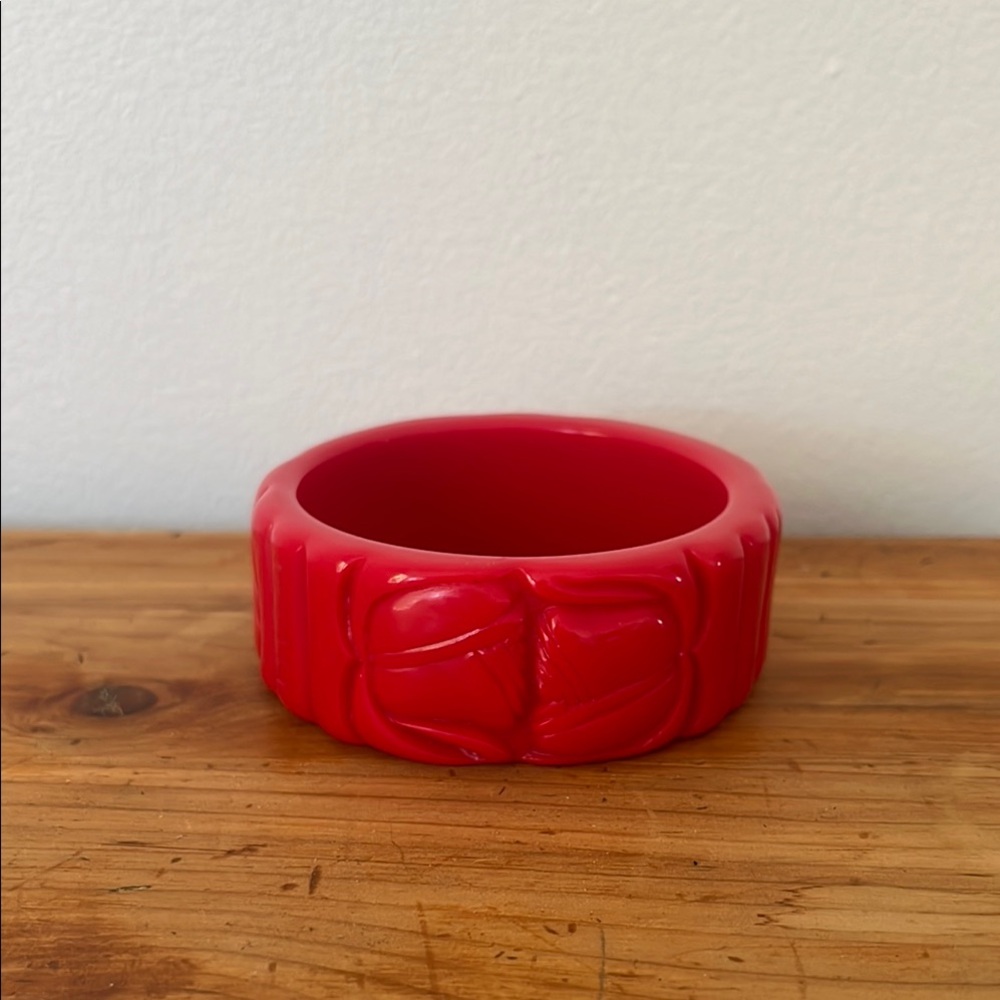 Vintage cherry red carved bakelite bangle